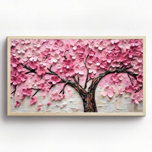 Puede incluir: Una pintura de un cerezo en flor rosa con un efecto texturizado en 3D. El árbol está pintado en tonos de rosa y blanco, con un tronco y ramas marrones. El fondo es de color beige claro.