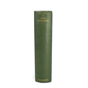 May include: A green hardcover book with gold lettering on the spine that reads "The Plays of John Galsworthy" and "Duckworth" at the bottom.