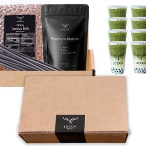 May include: A brown cardboard box with a black label that says "LOCCA Boba Tea" and a smaller label that says "Premium Matcha". The box contains a bag of boba tapioca balls, a bag of matcha powder, a set of black boba straws, and eight clear plastic cups filled with green matcha boba tea.