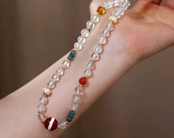 Natural clear quartz phone strap, paired with natural pearls and natural agate.