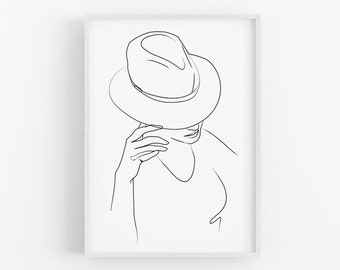 Könnte beinhalten: Minimalistischer Kunstdruck mit einer Strichzeichnung einer Person, die einen Fedora-Hut trägt. Die schwarze Strichzeichnung ist vor einem weißen Hintergrund platziert und erzeugt eine schlichte, aber elegante Ästhetik. Das Kunstwerk ist in einem weißen Rahmen gerahmt.
