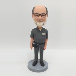 Custom Polymer Clay Bobblehead: Personalized Action Figure