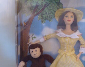 curious george barbie doll value