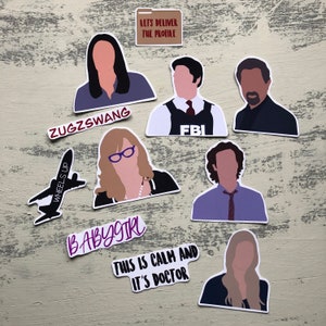 May include: A set of nine stickers featuring various characters and phrases. The stickers are printed on white paper with a glossy finish. The characters include a woman with long brown hair, a man with short brown hair, a man with a beard, a woman with blonde hair, a man with curly brown hair, and a woman with long blonde hair. The phrases include "ZUGZSWANG", "WHEELS UP", "LETS DELIVER THE PROFILE", "FBI", "BABYSTR", and "THIS IS CALM AND IT'S DOCTOR".