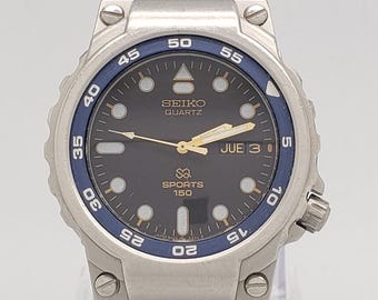 Reloj de pulsera vintage Seiko 5H23 633H Quartz SQ Sports 150 633L para hombre, esfera negra, día y fecha, resistente al agua, correa de caucho estilo Tag Heuer K35