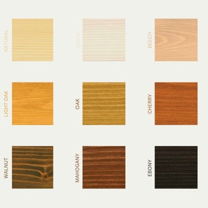 May include: Nine wood stain color samples, showing different shades of wood from light to dark. The colors are: Natural, White, Beech, Light Oak, Oak, Cherry, Walnut, Mahogany, and Ebony.
