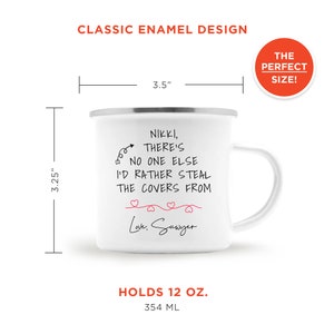 May include: White enamel mug with a black and red design. The mug reads "Nikki, there's no one else I'd rather steal the covers from. Love, Sawyer". The mug holds 12 ounces or 354 milliliters.