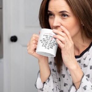 May include: White ceramic coffee mug with a black and red design. The mug reads "I'd walk through fire for you Mom. Well maybe not fire that would be too dangerous but a super humid room. But not too humid because you know my hair."