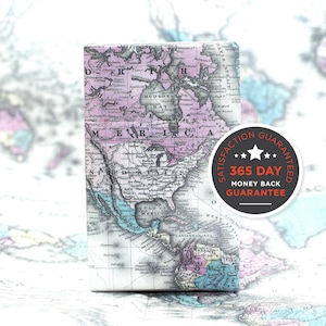 May include: Vintage map of North America with a pink, blue, and green color scheme. The map is framed with a black border and includes the text "365 Day Money Back Guarantee".