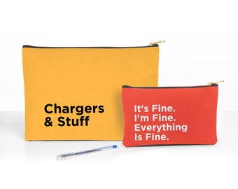 May include: Two yellow and red zippered pouches. The yellow pouch has the text "Chargers & Stuff" printed on it. The red pouch has the text "It's Fine. I'm Fine. Everything Is Fine." printed on it.