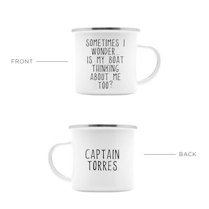 May include: White enamel mug with a silver rim and handle. The front of the mug has the text "SOMETIMES I WONDER... IS MY BOAT THINKING ABOUT ME TOO?". The back of the mug reads "CAPTAIN TORRES".