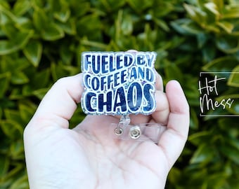 May include: A blue and white glitter badge holder with the text "Fueled by Coffee and Chaos".