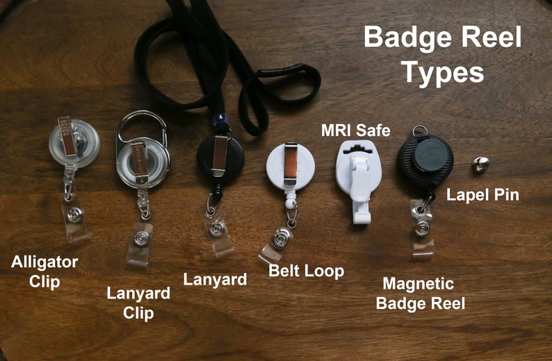 May include: A selection of badge reel types, including alligator clip, lanyard clip, lanyard, belt loop, MRI safe, magnetic badge reel, and a lapel pin. The text "Badge Reel Types" is displayed at the top.