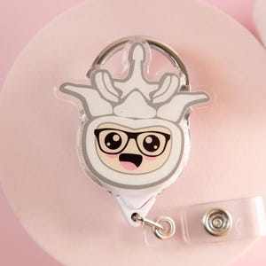 Leuke badgehaspel met bril, chiropractor-ID-houder