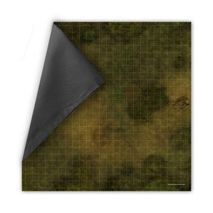 May include: A reversible gaming mat with a grid pattern. One side features a detailed, earthy landscape with green and brown tones, while the other side is solid gray. The mat is designed for tabletop role-playing games.