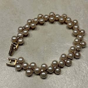 Nina Ricci Triple Gold Plated Pearl Swarovski Crystal Bracelet