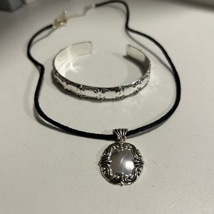 Avon Silver Toned Bracelet and Necklace Set