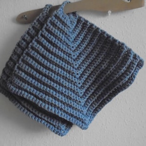 May include: Two crocheted pot holders in blue and gray with a striped pattern.