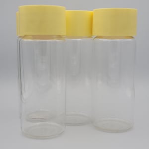 Pyrex Store n&#39; See Ware Yellow Lid 7&quot; Set of 4