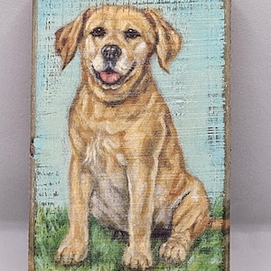 May include: A painting of a yellow Labrador Retriever sitting on a green grassy patch. The dog is looking at the viewer with a happy expression. The background is a light blue sky with white clouds.