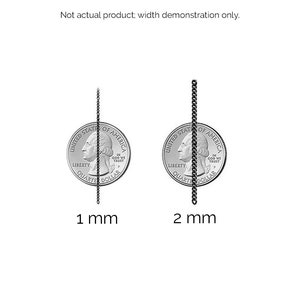 Puede incluir: Dos monedas de un cuarto de d&oacute;lar estadounidense con una cadena negra que pasa verticalmente por el centro de cada moneda. La cadena de la moneda de la izquierda tiene 1 mm de ancho y la cadena de la moneda de la derecha tiene 2 mm de ancho.