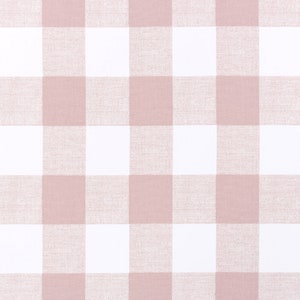 May include: A pink and white gingham fabric with a subtle texture.