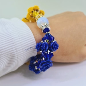 De twee wateren 6". Ilde de flores de las 2 aguas Oshun y Yemaya. Armband heilige