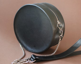 black round purse