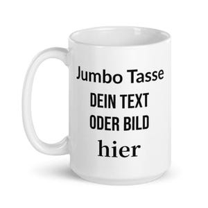 Peut inclure: Une tasse en céramique blanche avec du texte noir qui dit "Jumbo Tasse Dein Text Oder Bild hier".