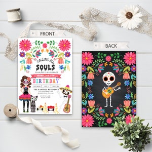 May include: A Day of the Dead themed birthday invitation with a colorful floral border. The front features a skeleton girl in a pink dress and a skeleton boy playing a guitar. The back features a skeleton playing a guitar on a black chalkboard background.