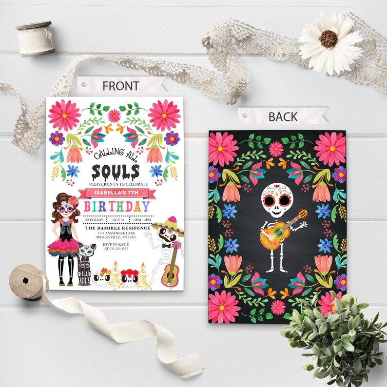May include: A Day of the Dead themed birthday invitation with a colorful floral border. The front features a skeleton girl in a pink dress and a skeleton boy playing a guitar. The back features a skeleton playing a guitar on a black chalkboard background.