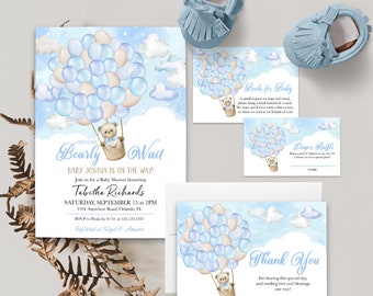 May include: A blue and white baby shower invitation featuring a teddy bear in a hot air balloon. The invitation reads "We can Bearly Wait Baby Joshua is on the way!" and includes the date and time of the shower. There are also cards for a diaper raffle and books for baby.