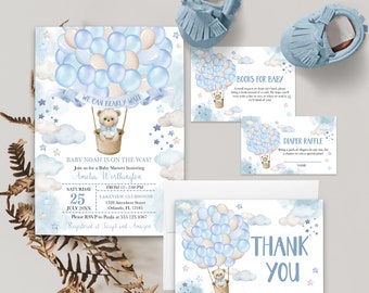 May include: A blue and white baby shower invitation with a teddy bear in a hot air balloon made of blue and white balloons. The invitation says "Baby Noah is on the way!" and includes details about the shower, including the date, time, and location. The invitation also includes a thank you card with a similar design.