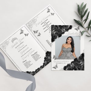 May include: A black and silver Quinceañera invitation featuring a photograph of the young woman in a silver dress. The invitation includes the text "Isabella Grace Quinceañera" and the date "September 16, 20xx".