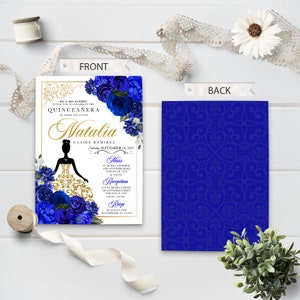 May include: Blue and gold Quincea&ntilde;era invitation with a silhouette of a girl in a gold dress and blue floral accents. The text reads "MR. & MRS. RAMIREZ INVITE YOU TO CELEBRATE THE QUINCEA&Ntilde;ERA OF THEIR DAUGHTER MATALIA CLAIRE RAMIREZ Saturday, September 16, 2021". The back of the invitation has a blue and gold patterned design.