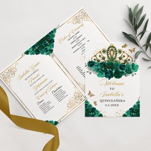 May include: A Quinceañera invitation with a gold and green color scheme. The invitation features a floral design with a crown and butterflies. The text on the invitation reads "Isabella Grace Quinceañera" and "Welcome to Isabella's Quinceañera 9.6.20XX".
