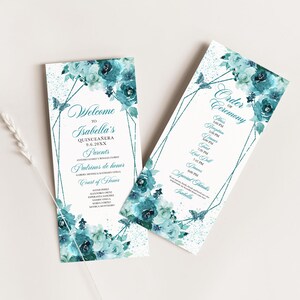 May include: A teal blue and white floral design with gold glitter accents. The text reads "Welcome to Isabella's Quinceañera 9.6.20XX" and lists the parents, padrinos de honor, and court of honor. The second card lists the order of ceremony with times for each event.
