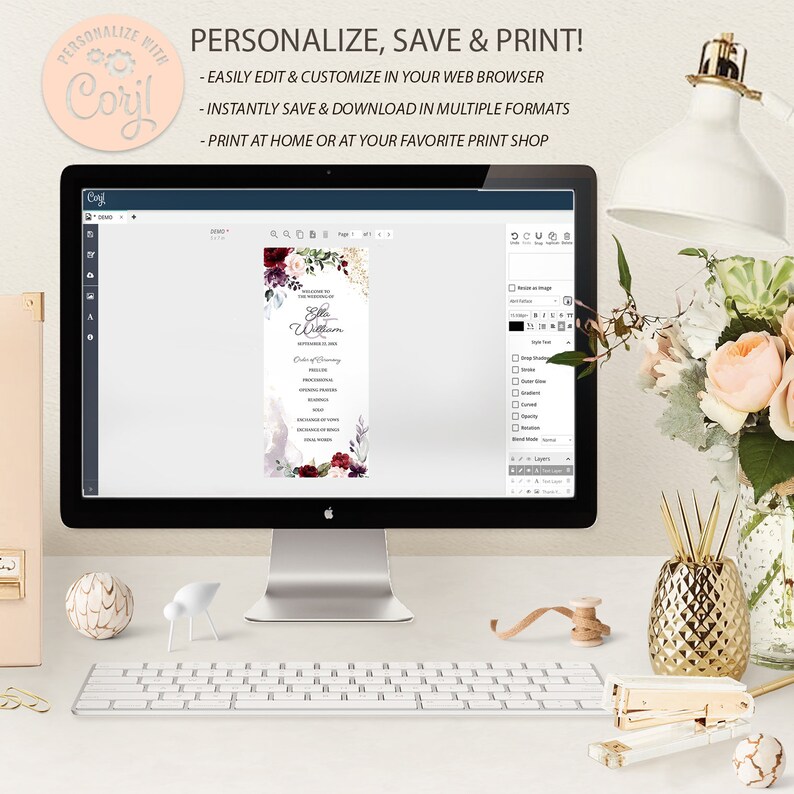 May include: A computer screen displaying a wedding program template with a floral design in shades of burgundy, pink, and white. The text on the screen reads "Welcome to the Wedding of Ella & William" and includes the order of ceremony. The screen is on a desk with a keyboard, a gold pineapple vase with flowers, and a gold stapler.