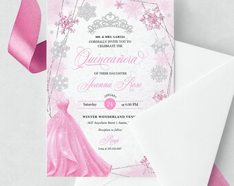 May include: A pink and silver Quinceañera invitation with a snowflake design. The invitation features a pink dress with glitter and a crown. The text reads "MR. & MRS. GARCIA CORDIALLY INVITE YOU TO CELEBRATE THE Quinceañera OF THEIR DAUGHTER Joanna Rose Saturday JANUARY 24 at 6:00 PM WINTER WONDERLAND VEN" 5437 Anywhere Street | Austin, Reception to follow Rayp Lena at 555-123-4567