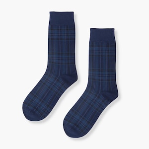 May include: A pair of blue socks with a plaid pattern.