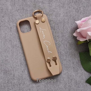 Custom Wrist Strap Band Soft Phone Case,Personalized Name Phone Case,iPhone Case With Built In Grip,Best Sell Gift,iphone 16 pro max case