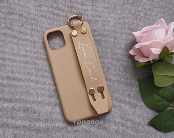 Anpassat handledsremsfodral med mjukt telefonskal, personligt namnfodral, iPhone-skal med inbyggt grepp, bästsäljande present, iPhone 16 pro max-skal
