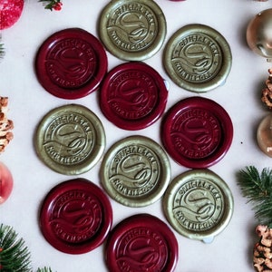 Selos oficiais de cera do Pólo Norte do Papai Noel em vermelho e dourado - pacote com 10