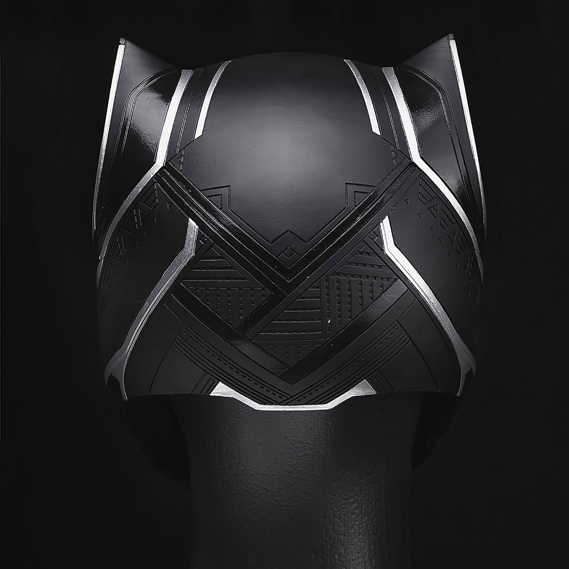 black panther holding helmet