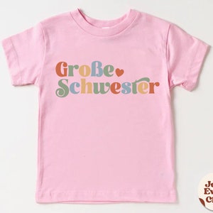 Große Schwester Kleinkind-Shirt, Schwangerschaftsankündigung, Baby-Ankündigung, deutsches Kinder-T-Shirt Kleine Schwester, Sibling Natural Infant, Schwester Pink