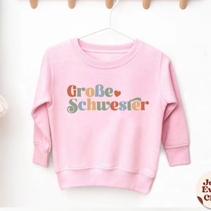 Große Schwester Kleinkind-Shirt, Schwangerschaftsankündigung, Baby-Ankündigung, deutsches Kinder-T-Shirt Kleine Schwester, Sibling Natural Infant, Schwester Bild 7