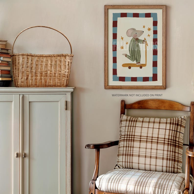 May include: A framed print depicting a mouse on a scooter, wearing striped pyjamas. The artwork has a cream background with a red and blue border, and is set in a wooden frame. The image has a whimsical style.