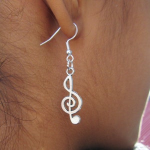 Silver treble clef drop earrings