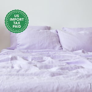 Set di lenzuola in lino lilla, 1 lenzuolo piano, 1 lenzuolo con angoli e 2 federe. Biancheria da letto in lino ammorbidito. Set di biancheria da letto viola stonewashed.