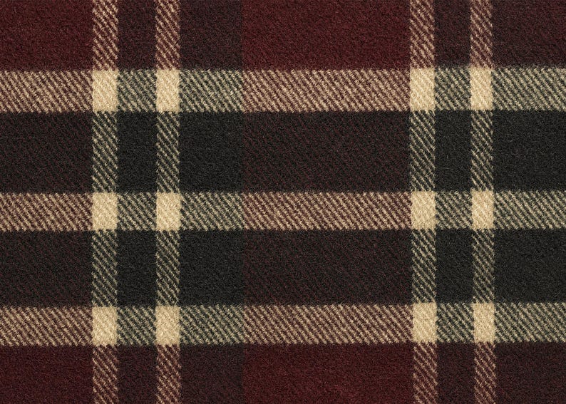 May include: Close-up of a plaid fabric with a repeating pattern. The design features a grid of intersecting lines in burgundy, black, beige, and brown. The fabric has a textured appearance, suggesting a woven material.